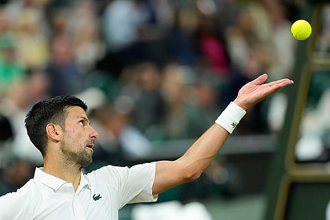 Novak Djokovic serves to Holger Rune